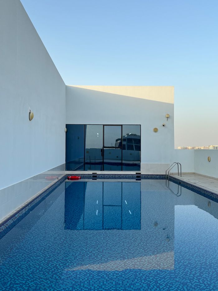 Explore this elegant rooftop pool with minimalist architecture in Dubai's skyline.